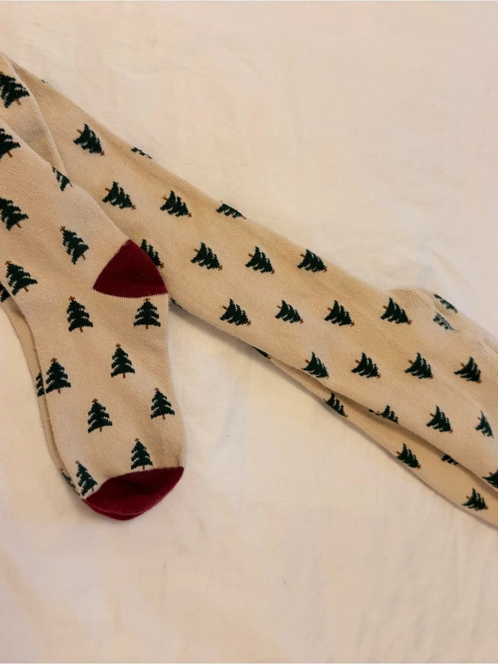 Little Stocking Co. beige cotton tights with Green Tree Pattern and Maroon Toe